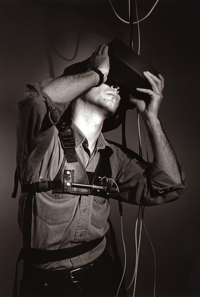 <strong>Figure 15.3 </strong>An "immersant" wearing stereoscopic head-mounted display and breathing/balance interface vest for a performance of Char Davies's Osmose (1995).