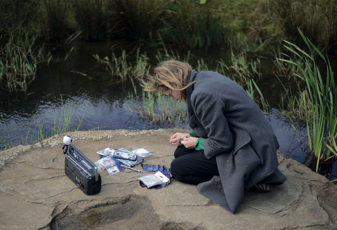 Katharine Vega at work on Of the Spheres, mixed reality performance at the Crawick Multiverse land art site by Charles Jencks, Dumfries and Galloway, 2017.